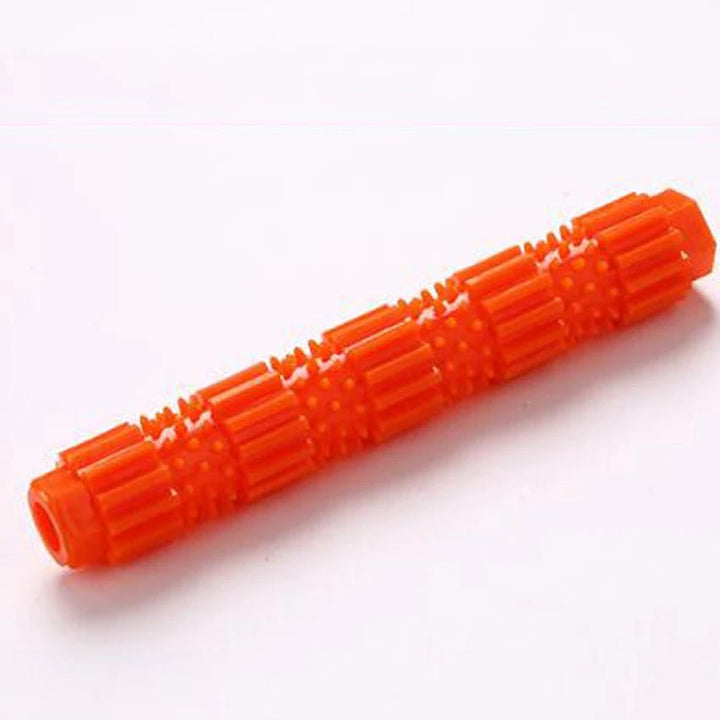 Red rubber indestructible dog chew toy for aggressive chewers, textured surface