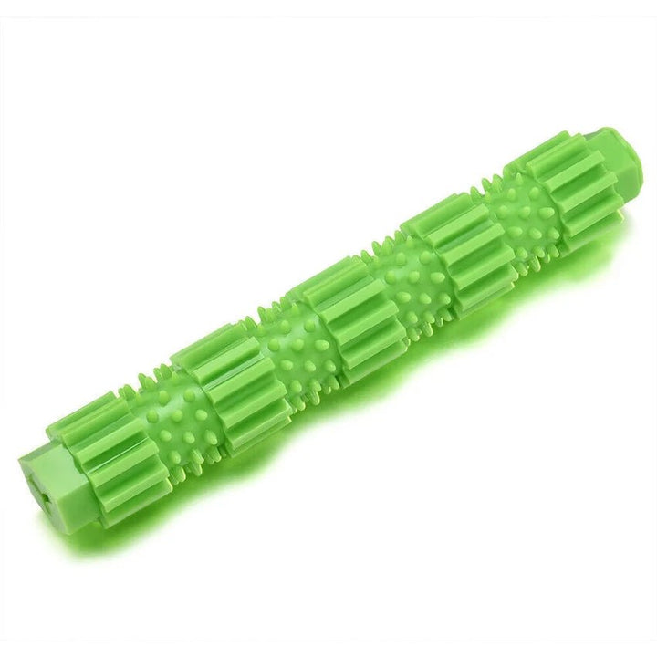 Close-up of durable dog chew toy, yellow, showing treat dispensing feature