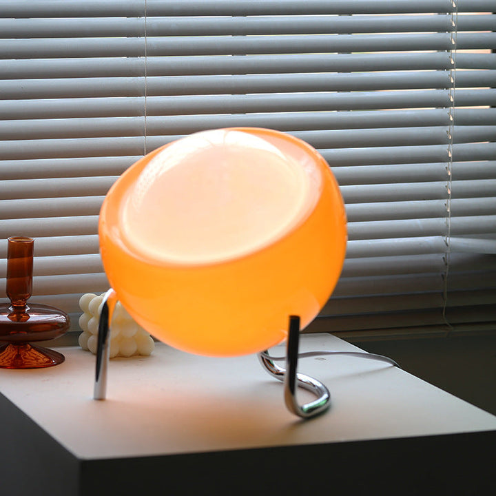 Unique retro glass orb lamp with Nordic flair. Ambient LED table light, a perfect modern classic home decor accent.