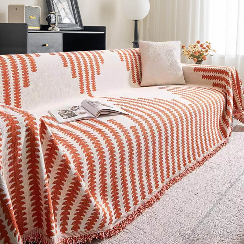 Full view of a living room sofa protected by a new chenille furniture cover, reversible and anti-scratch, washable.
