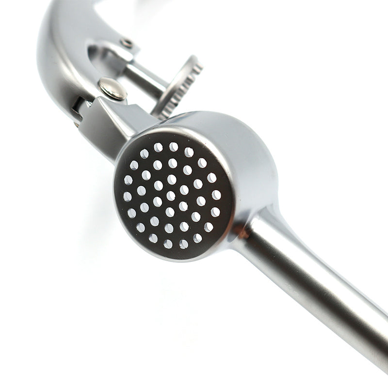 Robuste Edelstahl Knoblauchpresse mit ergonomischem Griff, große Kammer, ideal für Küche, einfache Reinigung.