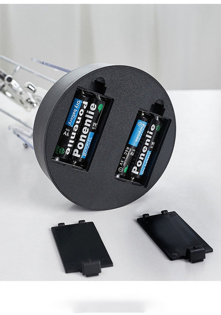 Rotierendes Perpetuum Mobile-Pendel, dekoratives Ornament mit edlem Doppel-Dreifachring-Design, still und hypnotisch.