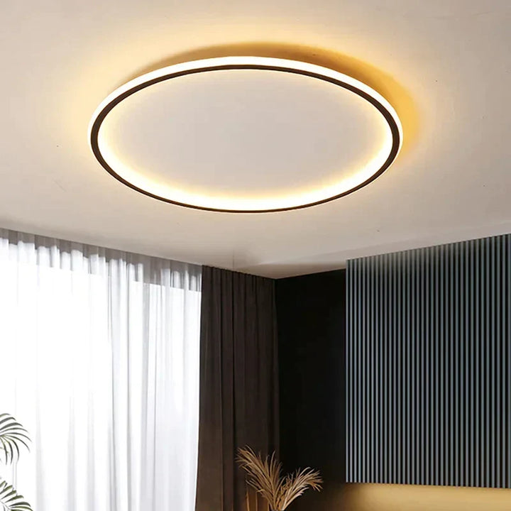 Runde LED-Deckenleuchte in skandinavischem Design, minimalistisch mit warmem Licht, ideal für Wohnraum oder Schlafzimmer.