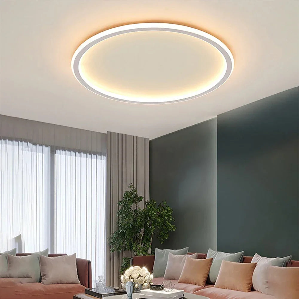 Runde LED-Deckenleuchte in skandinavischem Design, minimalistisch mit warmem Licht, ideal für Wohnraum oder Schlafzimmer.