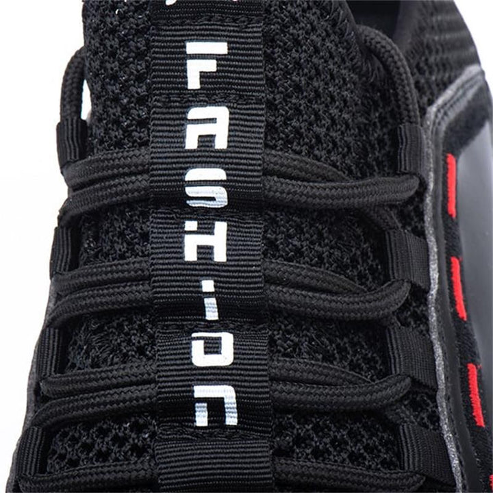 Rutschfeste, ultraleichte Sicherheitsschuhe mit schwarzer Stahlkappe und atmungsaktivem Mesh-Futter für Herren.