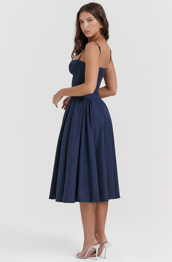 Chic taupe midi cocktail dress with a supportive corset, enhancing a flattering women's silhouette.