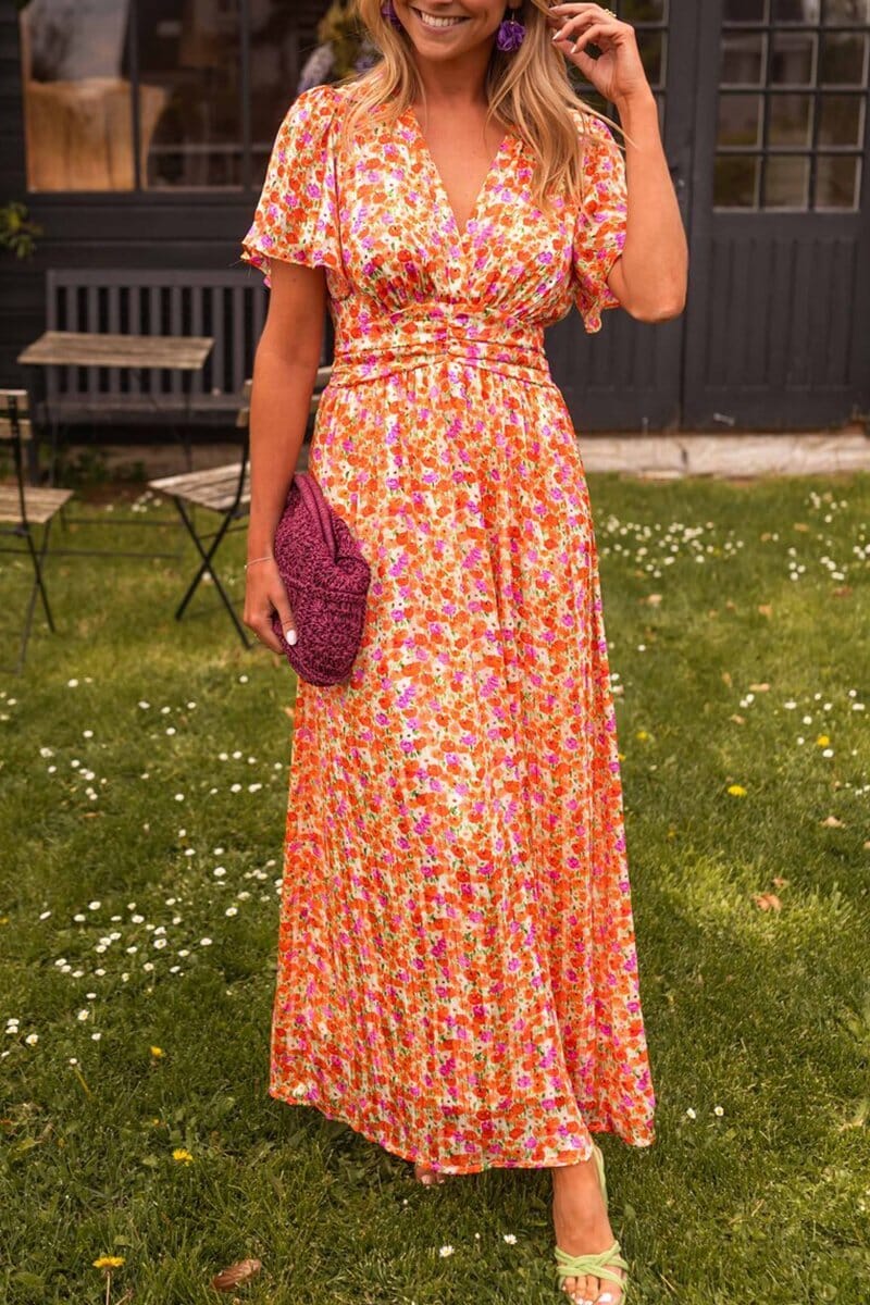 Elegant women's floral maxi dress with vibrant print, perfect for spring or summer wedding guests and special occasions.