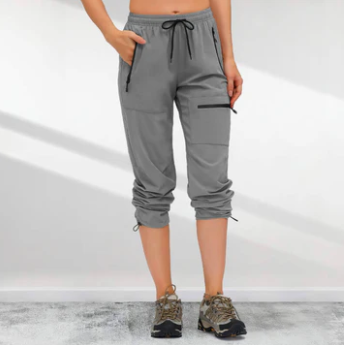 "Schnelltrocknende Damen Cargo Wanderhose, leicht, beige, Taschen, ideal für Outdoor-Aktivitäten und Alltag."