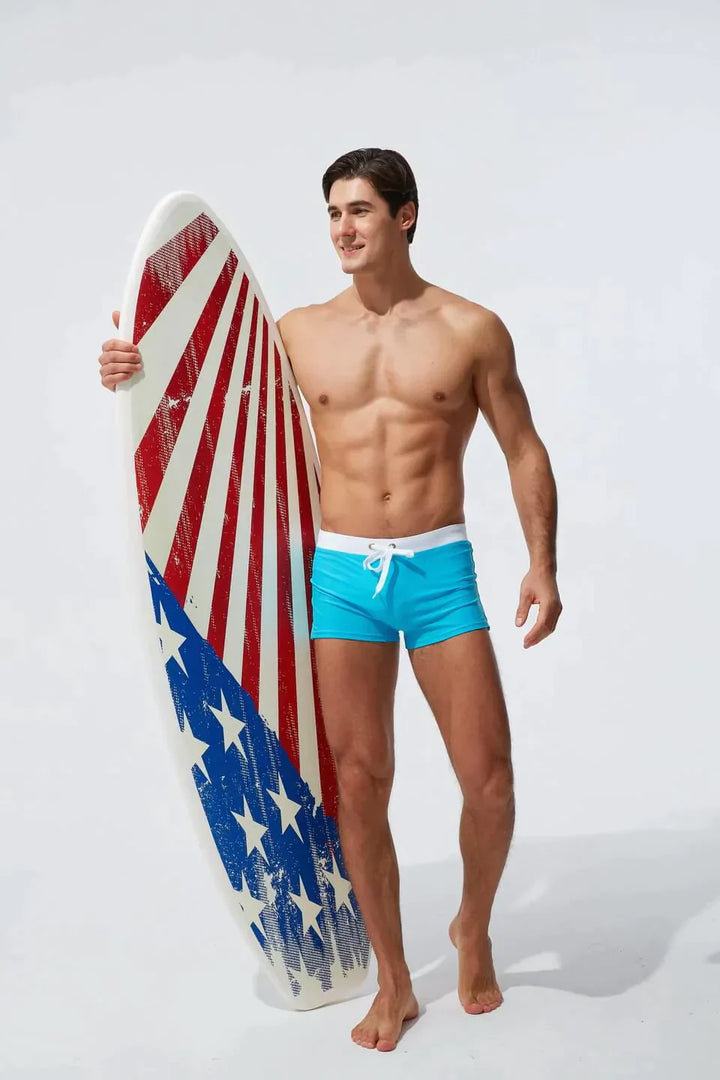 "Schnelltrocknende Herren Badeshorts mit Kordelzug, wasserdicht, blau, ideal für Strand- und Wasseraktivitäten."