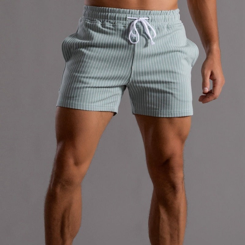 "Schnelltrocknende Herren Badeshorts Ripstop-Polyester in Blau, kurzer Schnitt, elastischer Bund, Frontansicht"