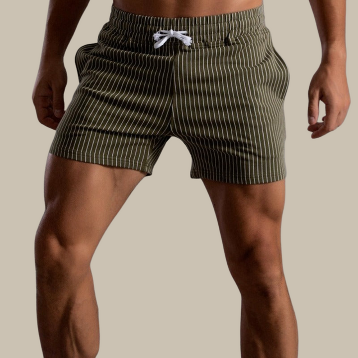 "Schnelltrocknende Herren Badeshorts Ripstop-Polyester in Blau, kurzer Schnitt, elastischer Bund, Frontansicht"