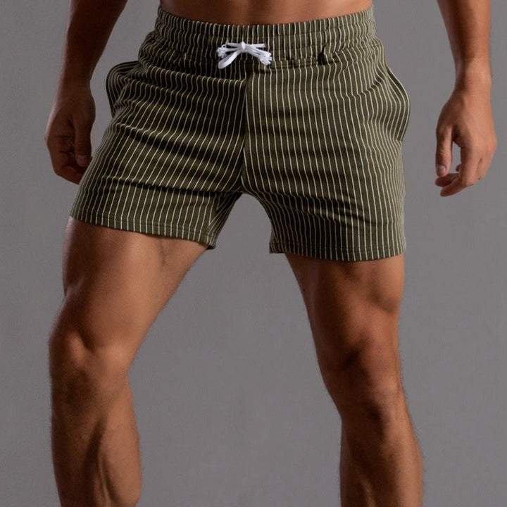 "Schnelltrocknende Herren Badeshorts Ripstop-Polyester in Blau, kurzer Schnitt, elastischer Bund, Frontansicht"