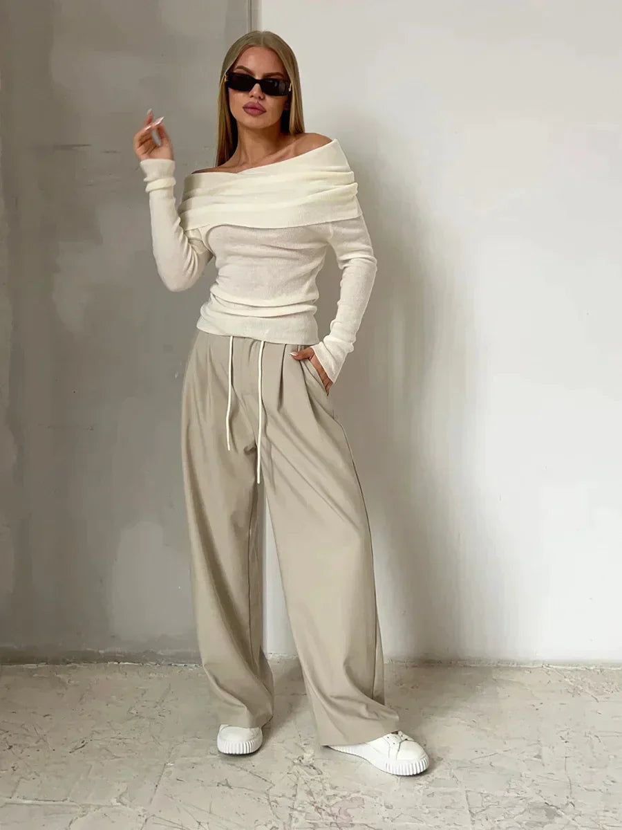 "Schulterfreier Damenpullover, elegantes Off-Shoulder-Design, weiches Material, figurbetonte Passform, vielseitiges Outfit"
