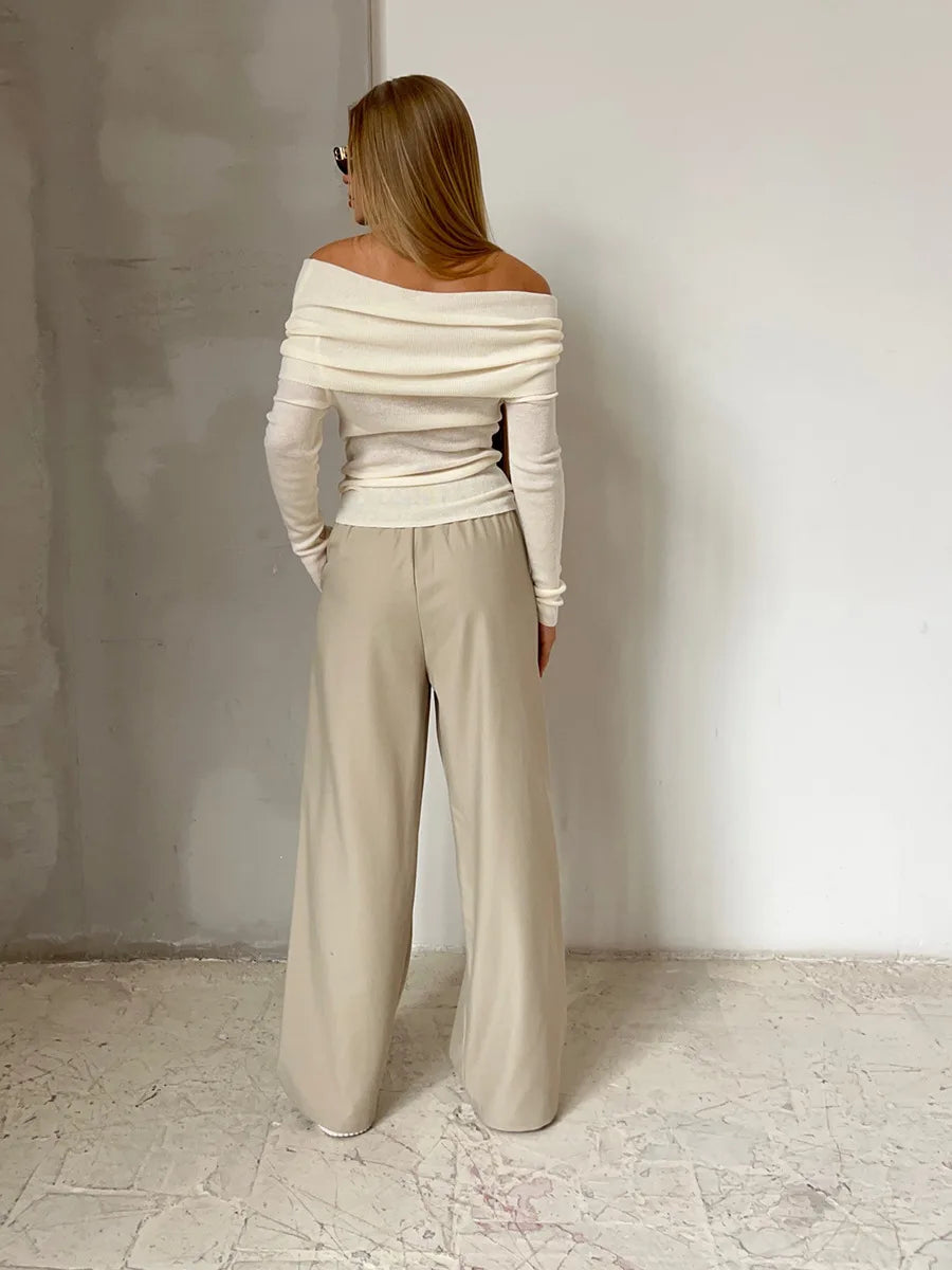 "Schulterfreier Damenpullover, elegantes Off-Shoulder-Design, weiches Material, figurbetonte Passform, vielseitiges Outfit"