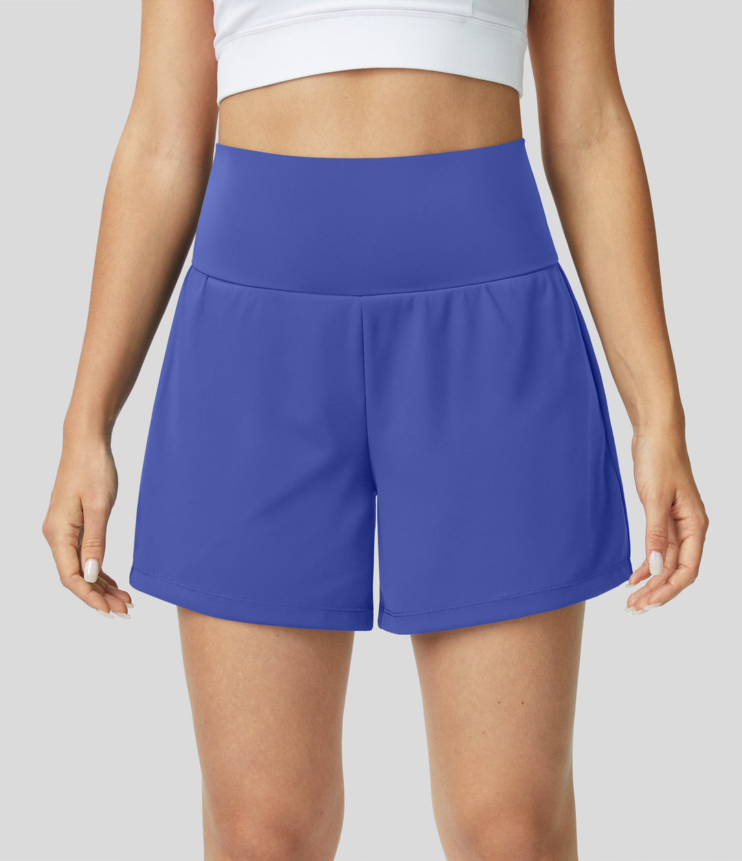 "Schwarze 2-in-1 Damen-Yoga-Shorts mit hoher Taille, atmungsaktivem Material und praktischen Taschen, ideal für Sport."