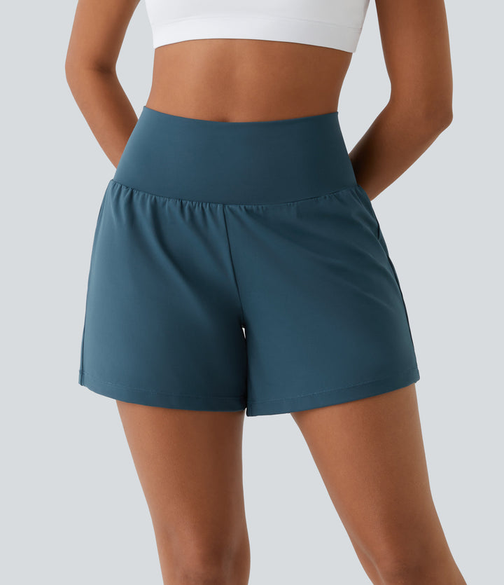 "Schwarze 2-in-1 Damen-Yoga-Shorts mit hoher Taille, atmungsaktivem Material und praktischen Taschen, ideal für Sport."