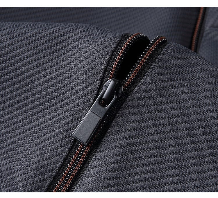 "Schwarzer Elite Trainingsanzug für Männer, modernes Design mit Stehkragen und Reißverschluss, flexibel und bequem."