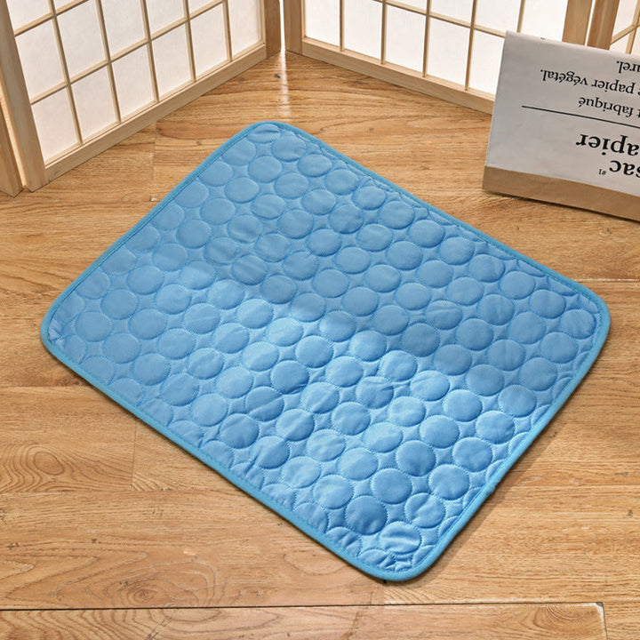 Portable pet cooling mat rolled up, showcasing its easy storage and transport