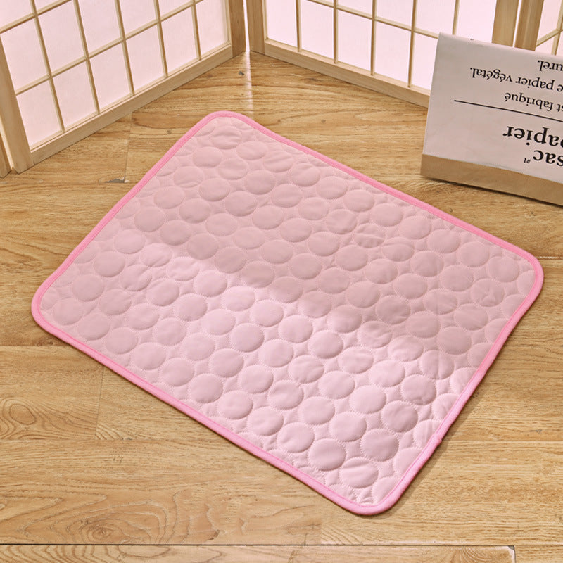 Two pet cooling mats side by side, various sizes for different pets, durable material