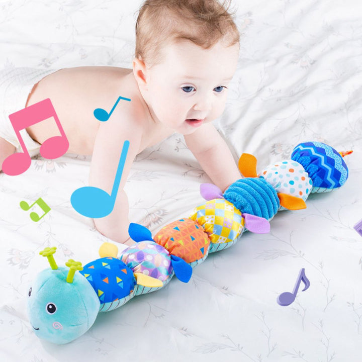 Sensorische Plüsch Rassel-Raupe mit Musik, bunten Farben und Texturen, ideal zur Förderung der Babyentwicklung.