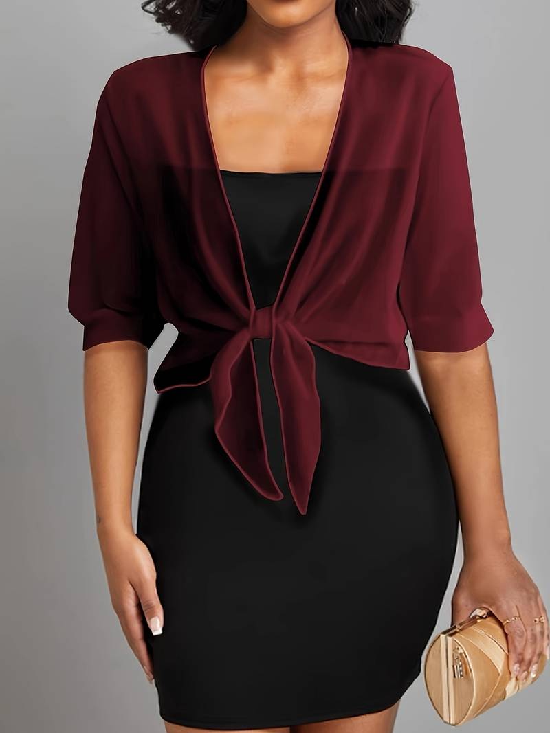 Modern women's sheer tie-front bolero. Cropped, half-sleeve top, an elegant & versatile layering piece.