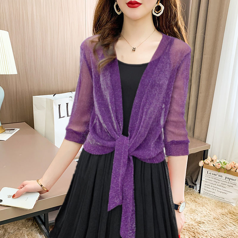 Chic sheer tie-front bolero, women's cropped top. Elegant half-sleeve layering piece for evening wear or casual.