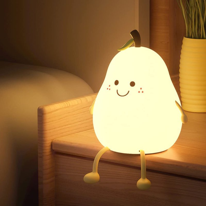 Child safe silicone night light with automatic shutoff, gentle glow, perfect sleep aid.