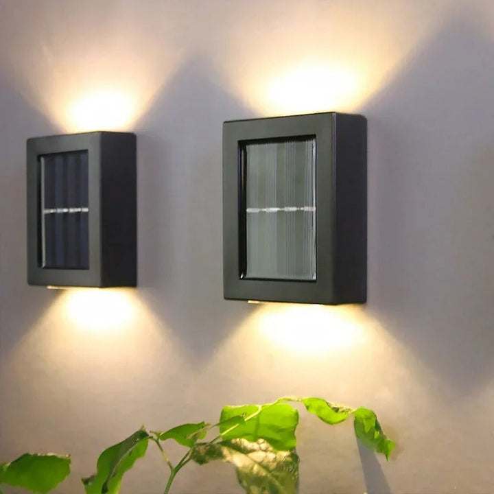 Bright solar LED wall lights for garden fences & patio perimeters, offering wireless, motion-sensing security.