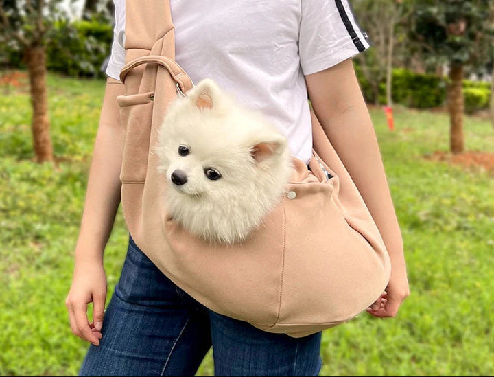Small dog carrier shoulder bag, comfortable pet sling for daily walks & travel.