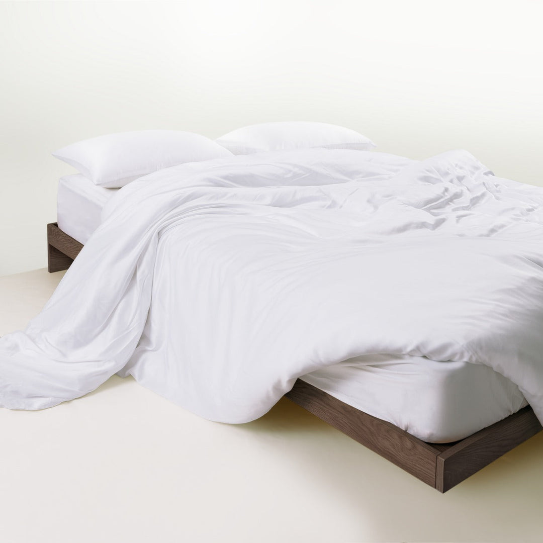Luxury bamboo bedding set on a queen bed, eco-friendly and family-friendly design