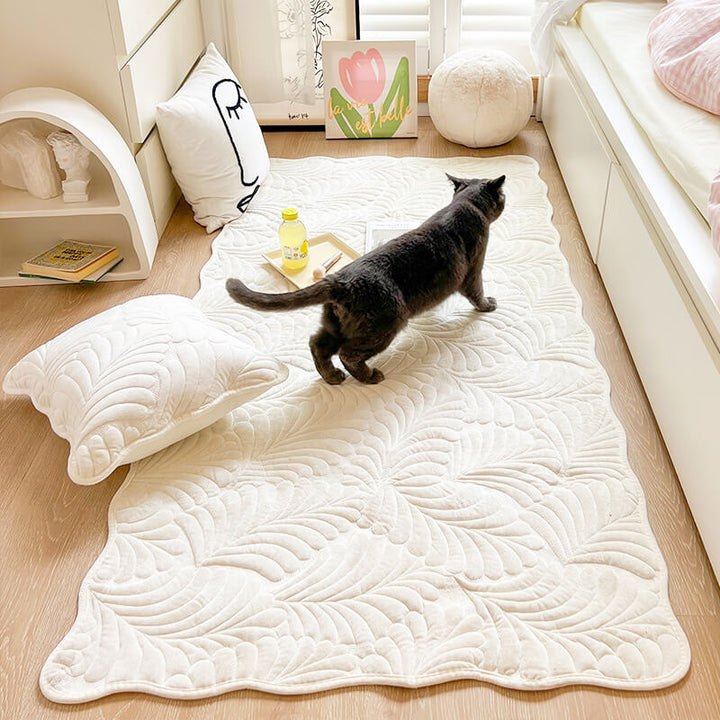 Durable cotton sofa cover with an intricate leaf pattern, designed to be anti-scratch. Easy to clean.