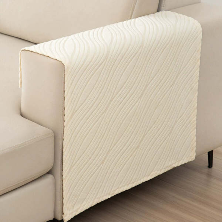 Two new furry non-slip armrest covers for sofa, beige, living room furniture protection.