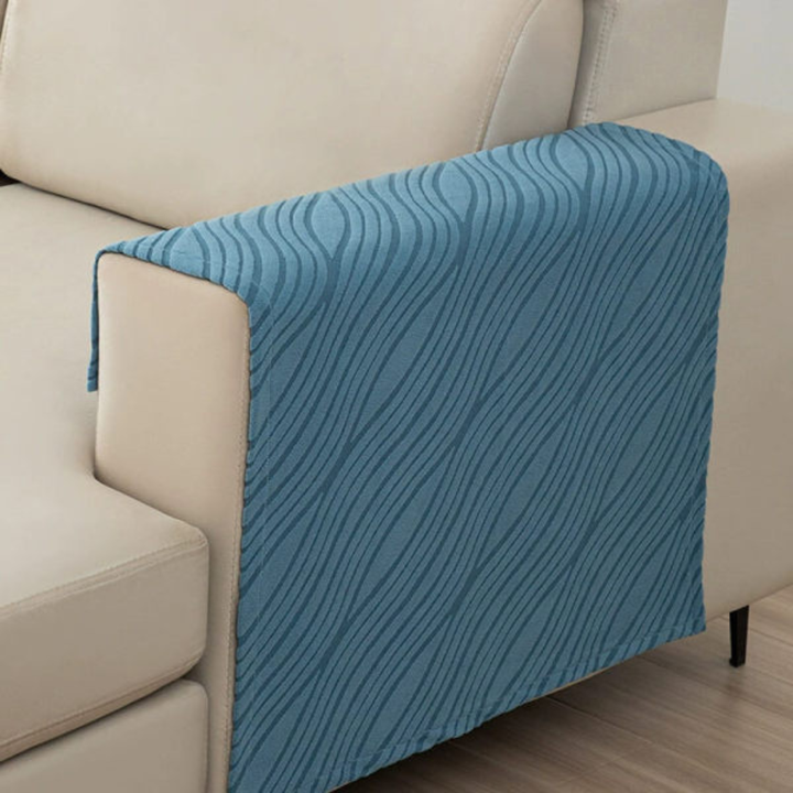 Luxurious furry non-slip armrest covers, machine washable, enhancing sofa comfort and decor.