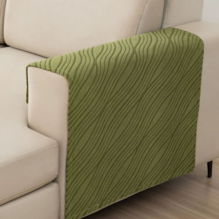 Detailed view of a soft, non-slip armrest cover for sofa, furry texture, home decor accessory.