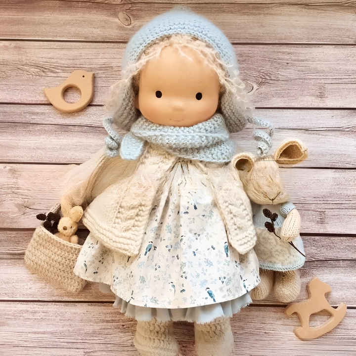 Soft & natural Waldorf doll, an organic cotton imaginative play toy for children.