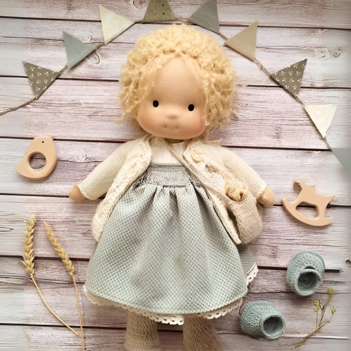 Handmade wool Waldorf doll, a gentle comfort toy for children's imaginative play.