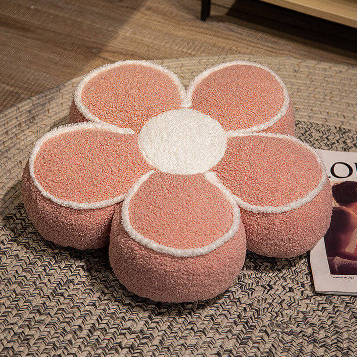 Soft plush flower throw pillow on a bed, cozy and decorative bedroom accent