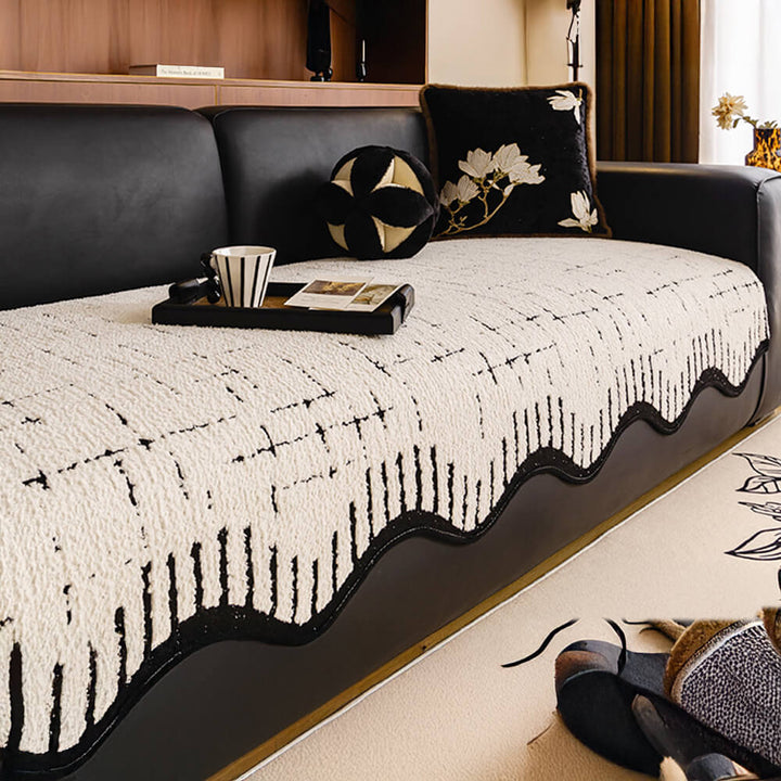 Soft plush couch cover with irregular wave edges in a living room setting, beige color.