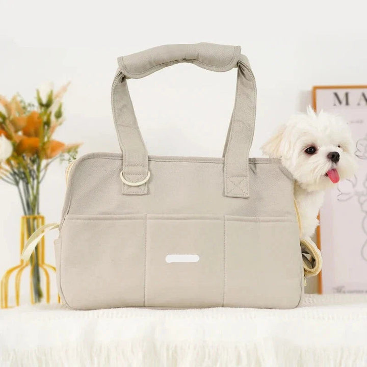 Comfortable portable dog carrier bag in blue, perfect for small dogs or cats, with shoulder strap