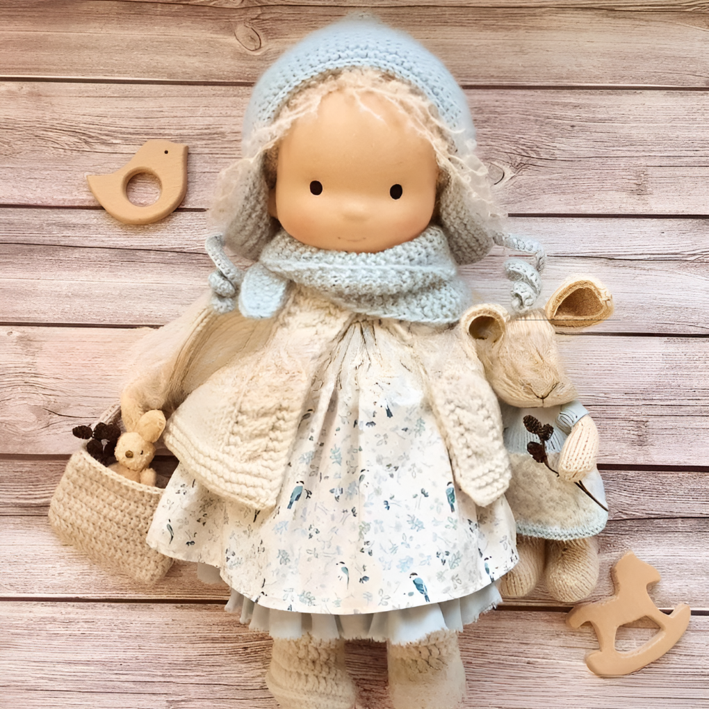 Handmade Waldorf baby doll, wool stuffed, a natural and gentle play friend for infants.