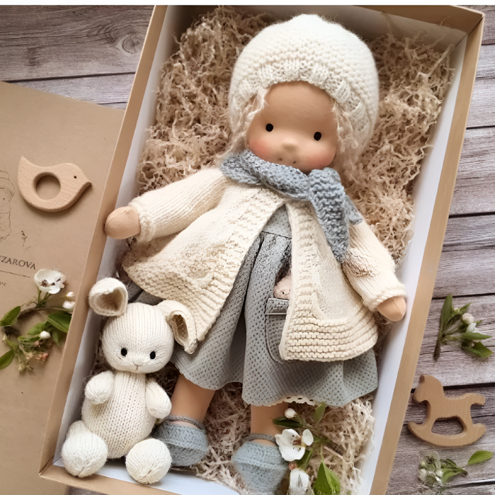 Organic cotton Waldorf doll, a cuddly stuffed toy and natural play friend for children.