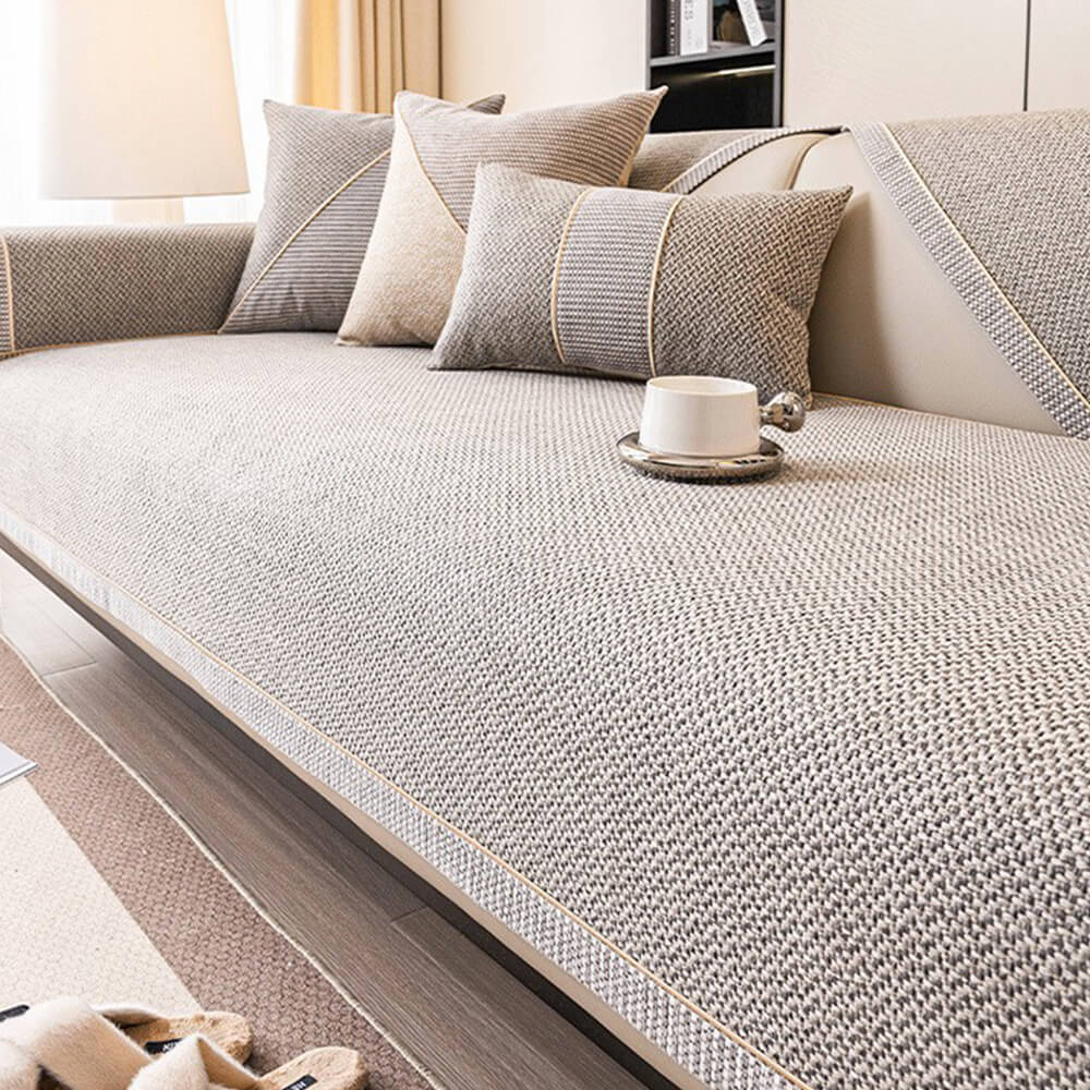 Beige woven sofa cover with non-slip backing, ideal for year-round home decor.