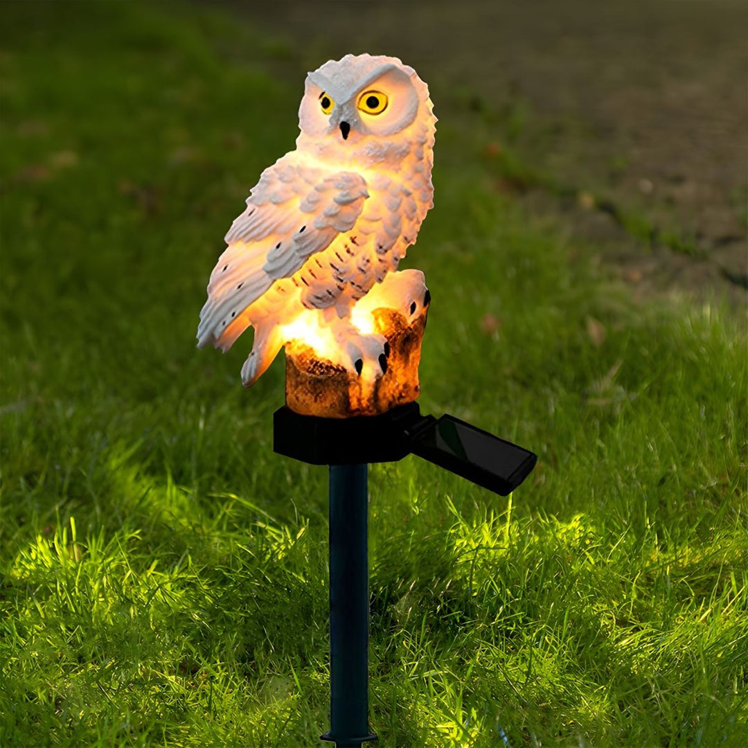 Solar powered owl garden LED light with stake, perfect for eco-friendly outdoor lawn decor.