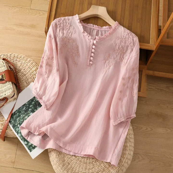 Elegant women's embroidered button-down blouse, classic long sleeve shirt for versatile sophisticated style.