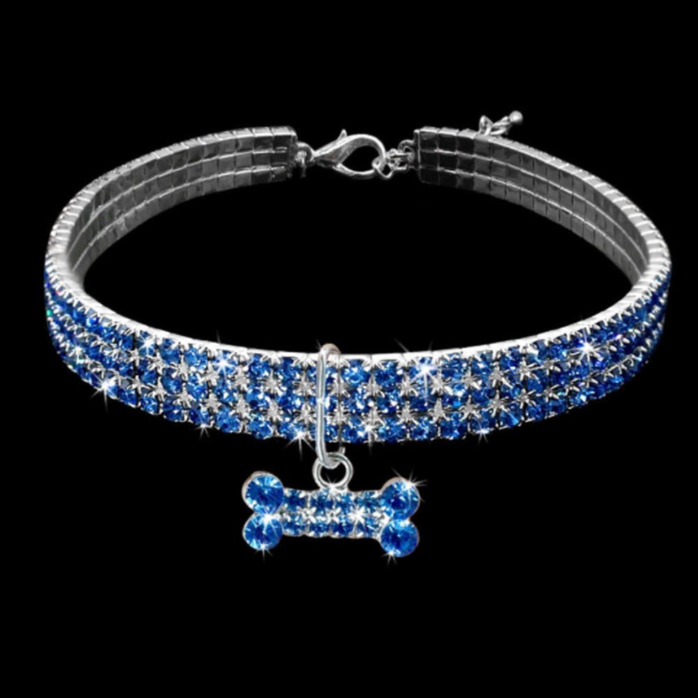 Glamorous standard dog collar with a full rhinestone setting and a small, shiny bone charm.