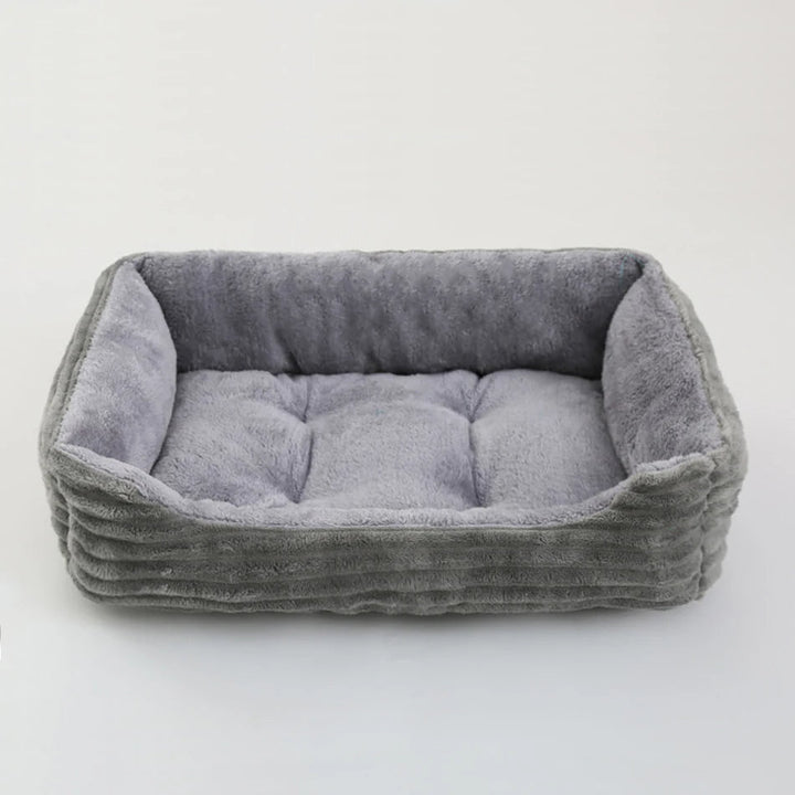 Grey square plush dog bed with waterproof oxford fabric, a comfortable pet cushion