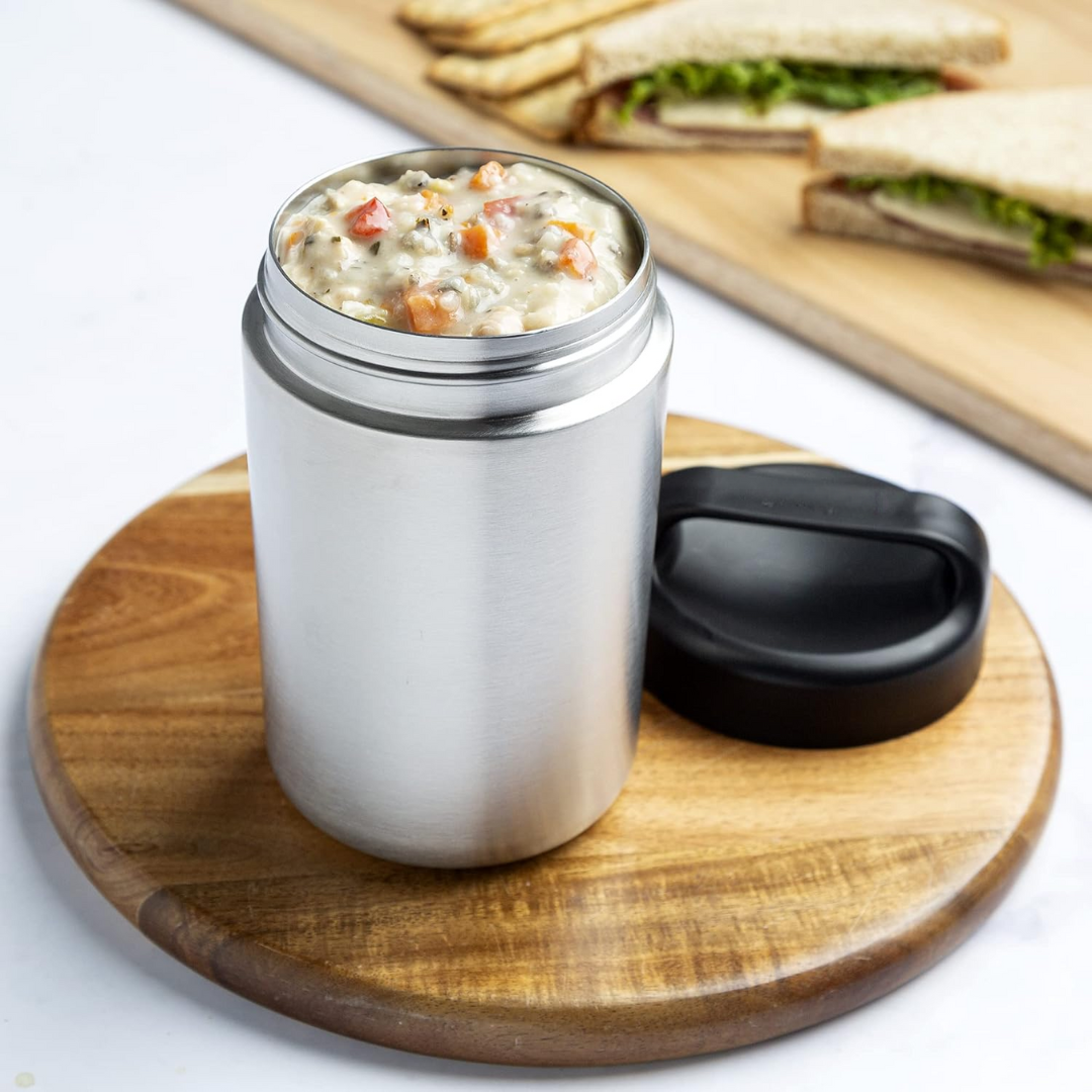 Stainless steel food warmer with integrated handle, perfect for carrying warm meals to work or school.