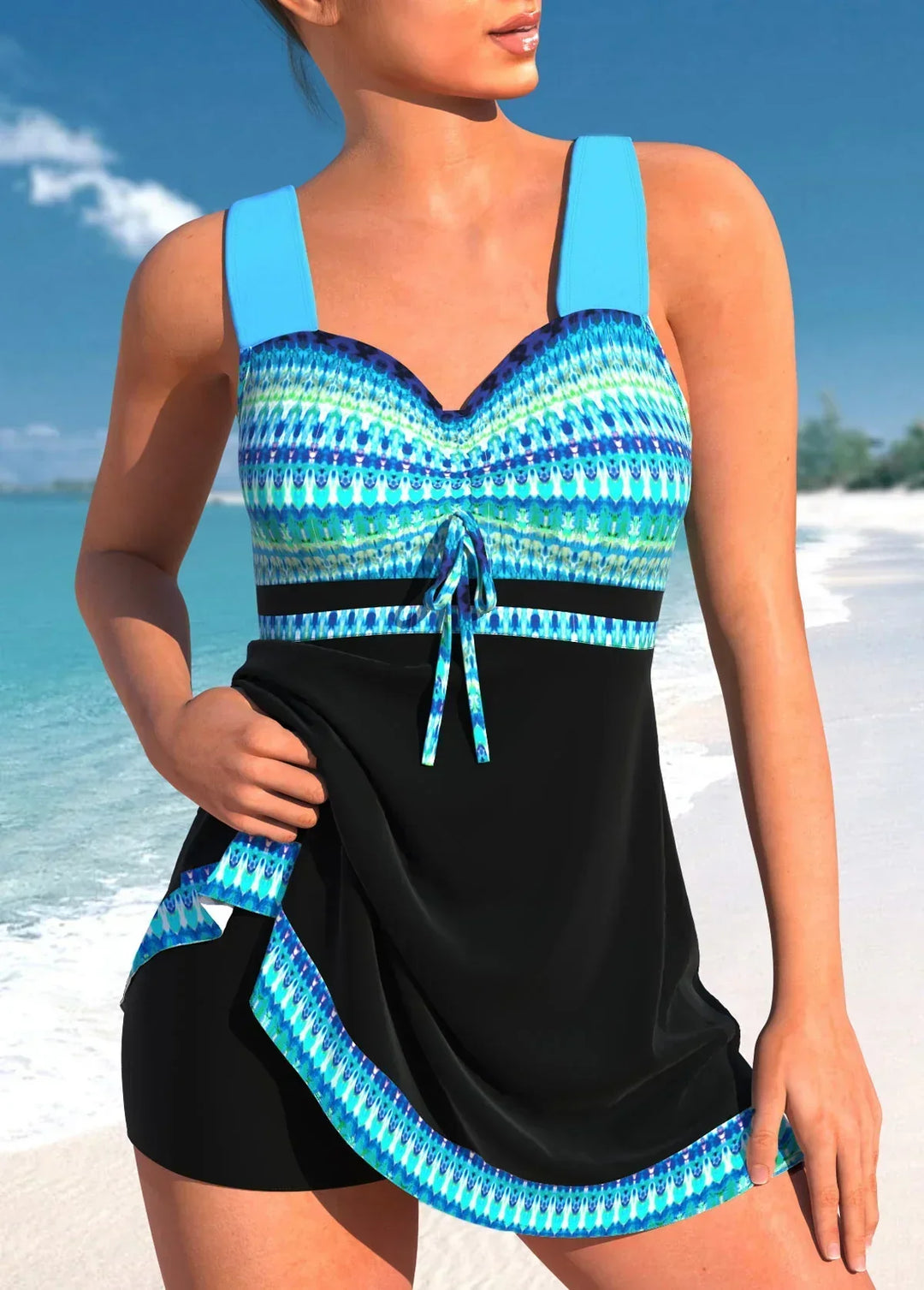 "Stilvoller Patchwork-Tankini in Blau-Schwarz mit modernen Mustern, ideal für Strand und Pool. Luftig und bequem."