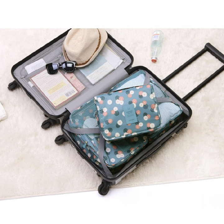 "Stilvoller Reise-Kulturbeutel, wasserdicht, mit Blumen-/Leopardenmuster, ideal für Kosmetikaufbewahrung unterwegs."