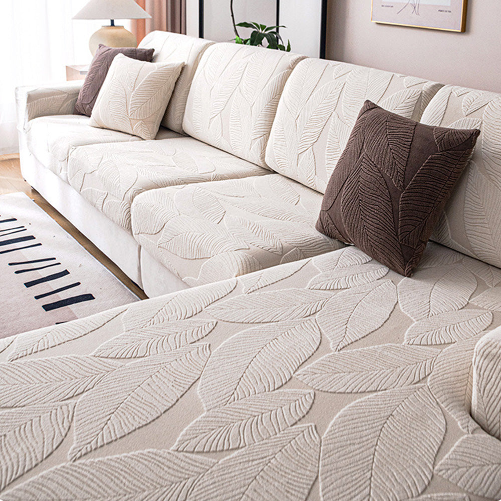Universal jacquard sofa cover with an attractive leaf design, offering robust pet protection.